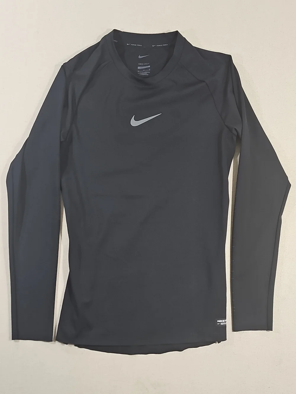 Nike Black Long Sleeve Dri-FIT Top with Silver Swoosh